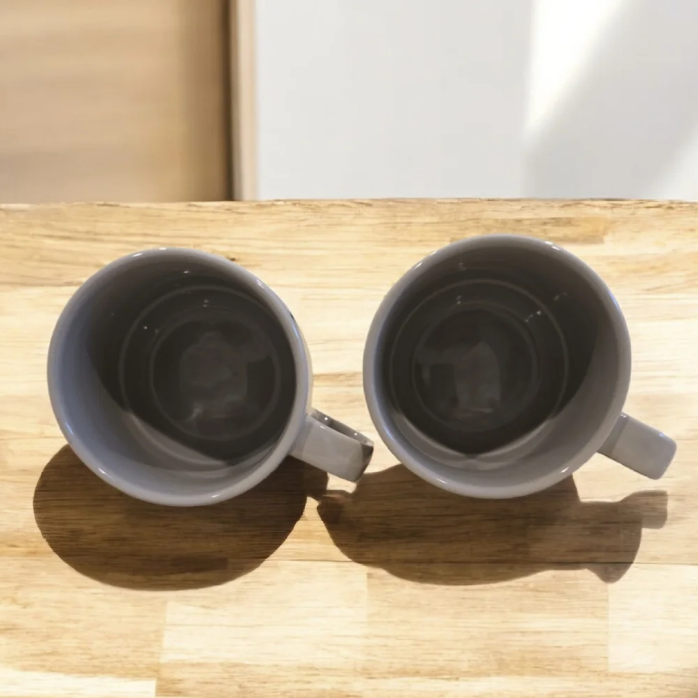 Set Of Two Crate & Barrel Cups By Martin Hunt